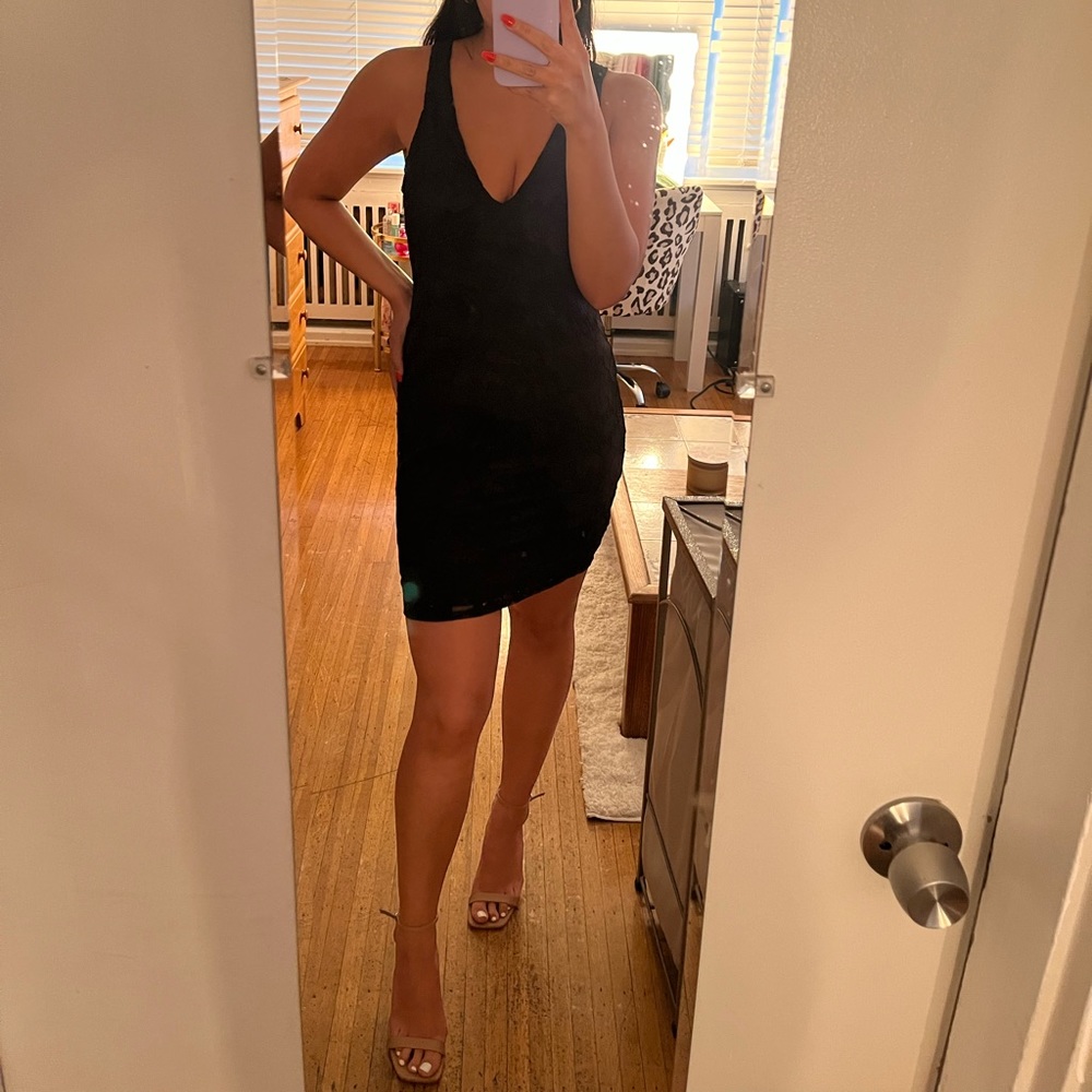 Black dress. Lightly worn. Pretty back.